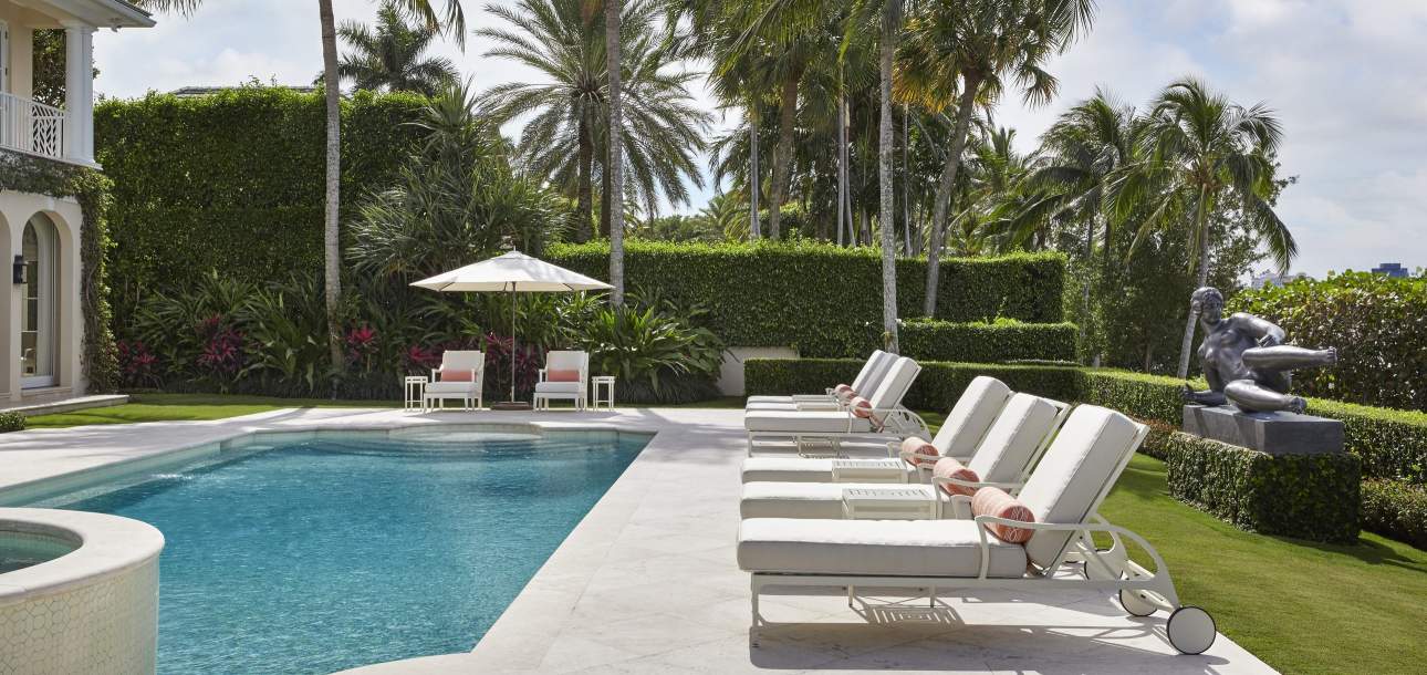 McKinnon and Harris Beaufort Sun Chaises Poolside in Palm Beach, Florida. Design by Linda Ruderman Interiors, Photo by Brantley Photography