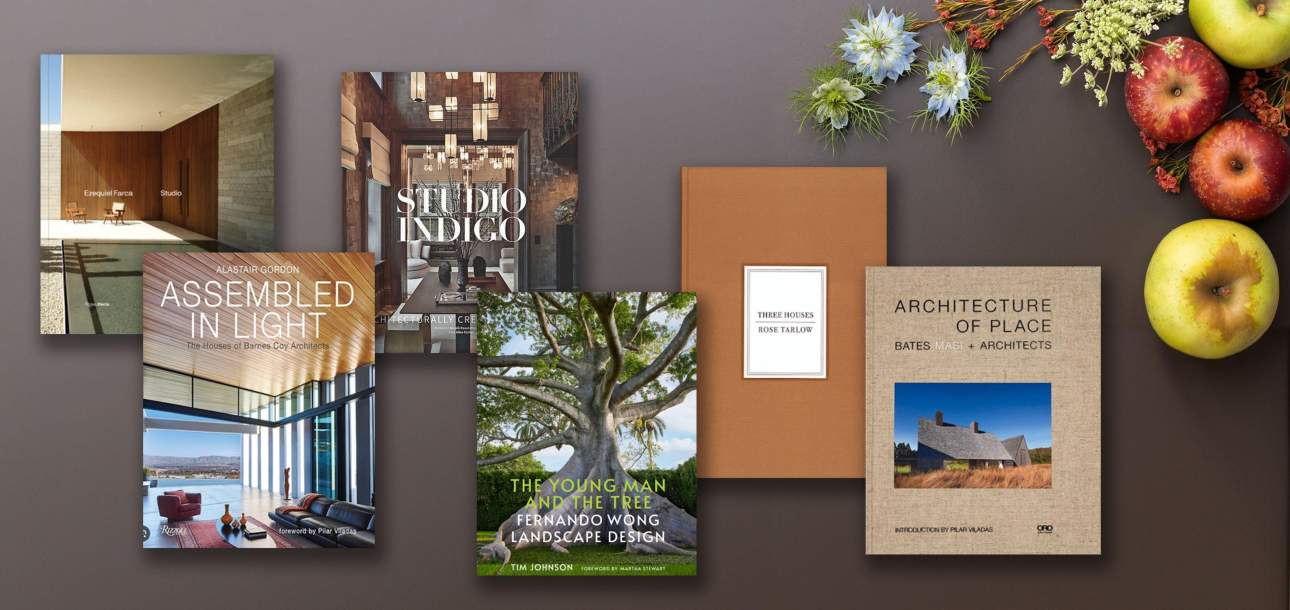 Flat lay of coffee table books on top of our McKinnon and Harris Jura Peat finish color