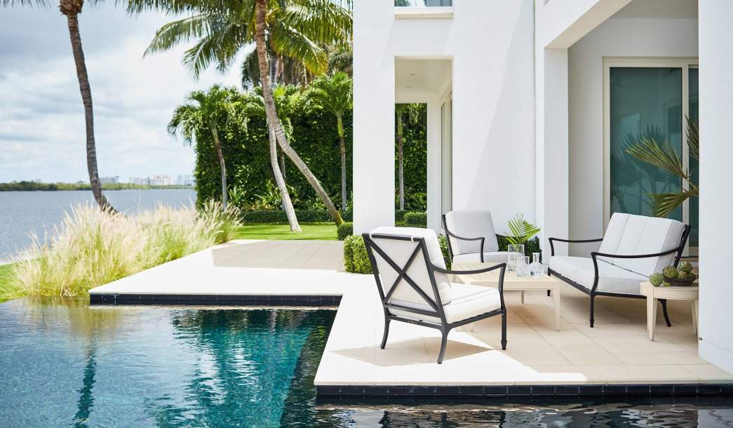 Beaufort Club Chair and Settee poolside in Miami, Florida