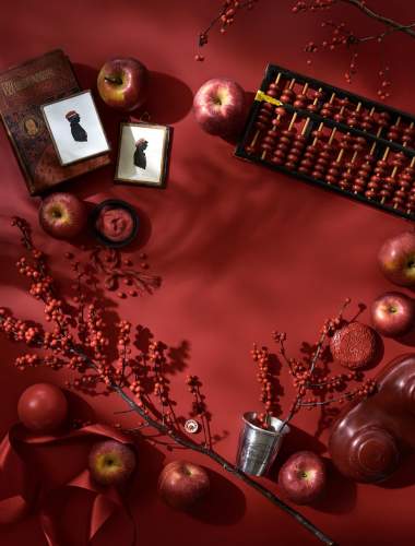 Flat lay mood board of McKinnon and Harris' Stayman Red high performance finish color