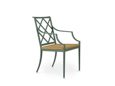 The Otey Dining Arm Chair with Rush Seat in Atlantic Green, featuring a Chinoiserie fretwork-inspired back design, sculpted arms, and a woven natural rush seat.