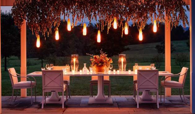 Stanhope Dining Table with Rives Dining Chairs under the night sky