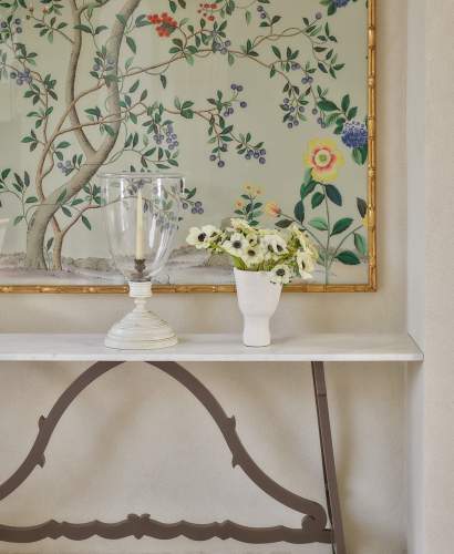 Campostela Console Table shown in Natural Bronze with Calacatta Michelangelo Extra Natural Stone Top and Bastille Lounge Collection, Shown in Natural Bronze with Aeolian Swan Fabric. Design by Suzanne Kasler, Photos by Emily Followill