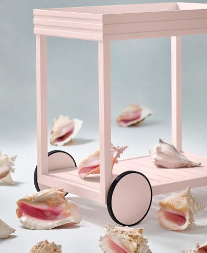 Perrow Drinks Cart finished in Parigi Pink and accented with large conch shells
