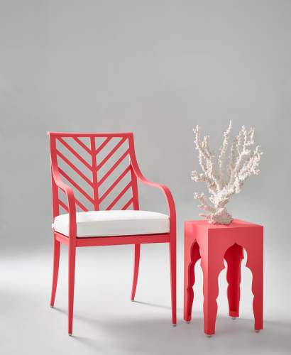 Buie Dining Arm Chair with Herringbone Back and Yves Table finished in Poinciana Coral