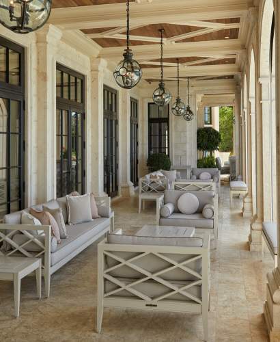 McKinnon and Harris Pavilion Collection and under a loggia at a home in Florida. Design by Heather Wells.