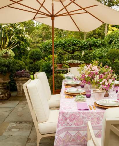 Beaufort Dining Chairs in Charlotte Moss's East Hampton garden, Photo by Trevor Parker