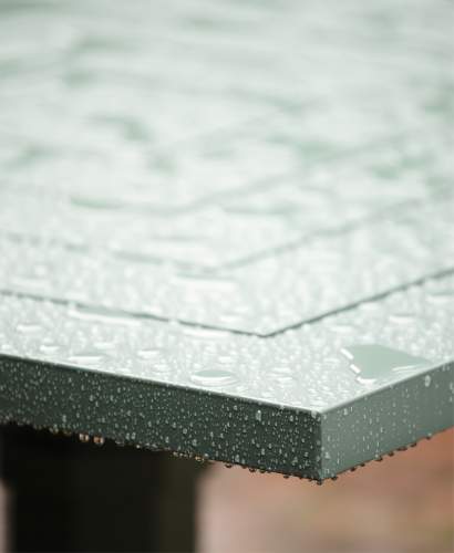 McKinnon and Harris outdoor table in rain