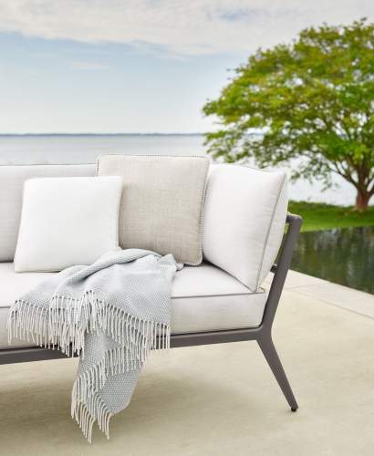 deCamp sofa with custom throw pillows and McKinnon and Harris deck blanket