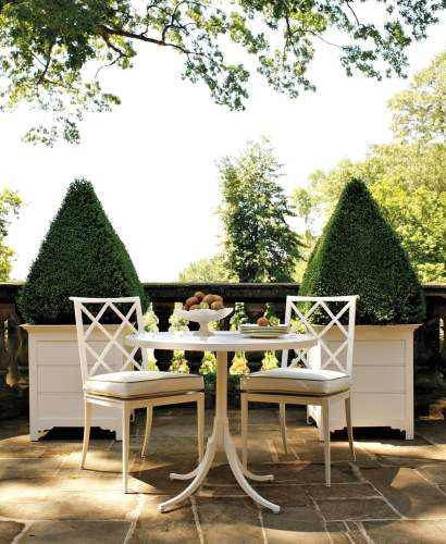 Ardlussa Palm Box behind an alfresco dining set