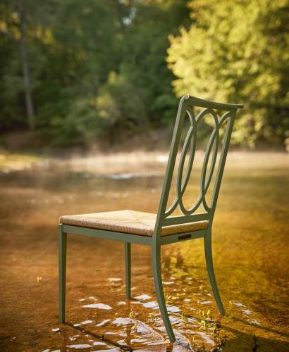 Buie Dining Arm Chair with Rush Seat, Shown in Shenandoah Gray Green in a creek to show its performance