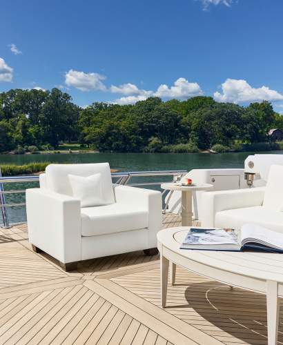 McKinnon and Harris Peristyle Club Chair on a yacht deck