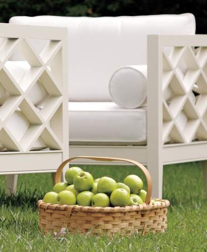 McKinnon and Harris Pavilion Furniture with a basket of green apples next to it