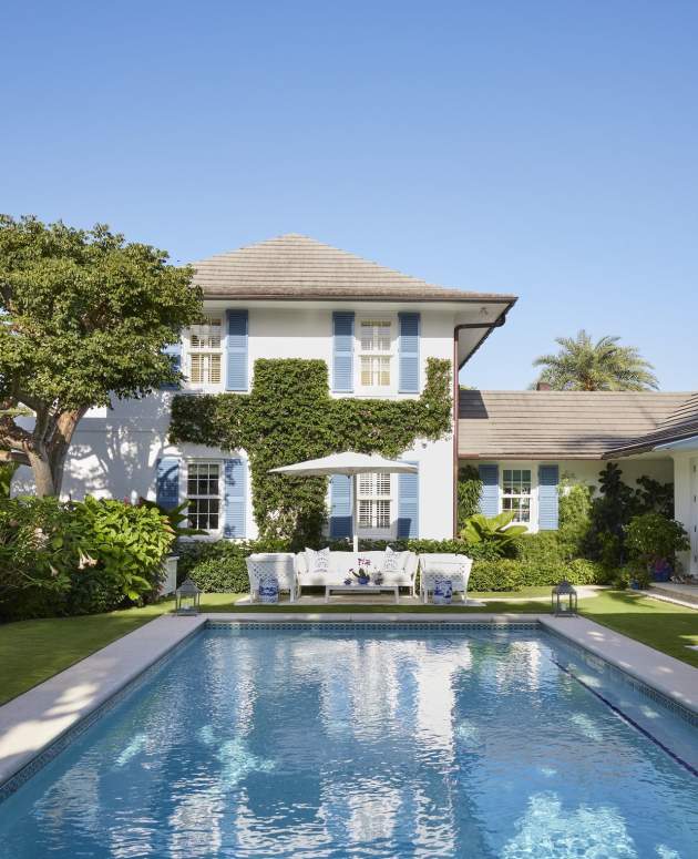 McKinnon and Harris poolside in Florida. Design by Kim Coleman, Photos by Brantley Photography