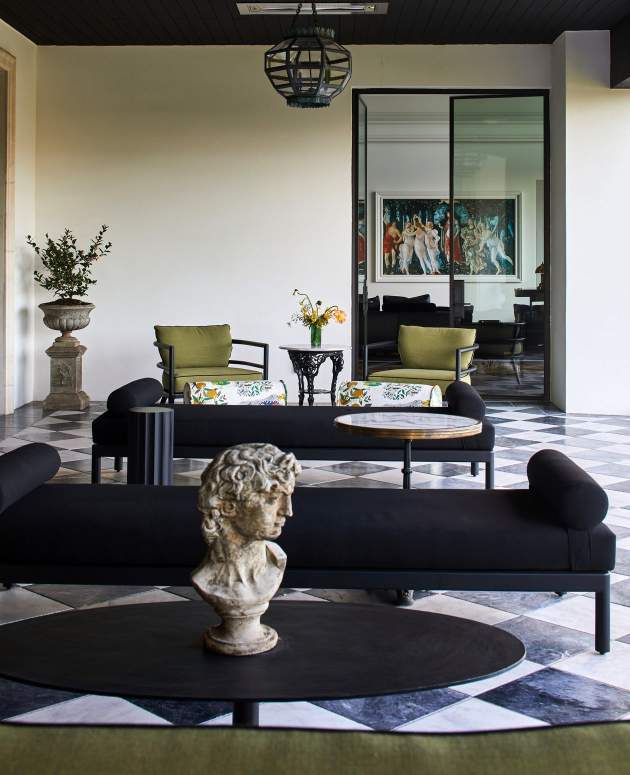 McKinnon and Harris Couper Backless Bench and deCamp Lune Club Chairs at a home in Arizona. Design by House of Turk.