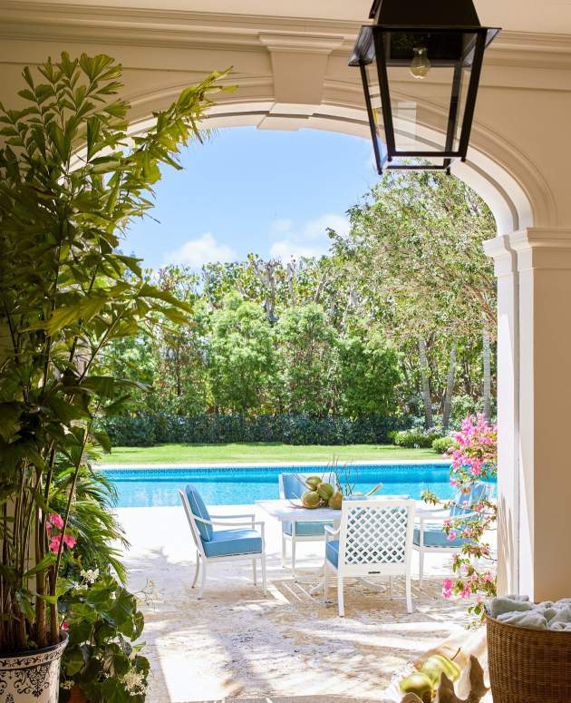 duVal DIning Arm Chairs at a home in Florida. Architecture by Schafer Buccellato Architects