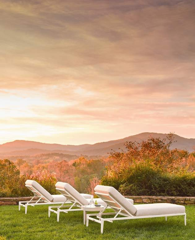 three deCamp Sun Chaises overlooking mountains at sunset