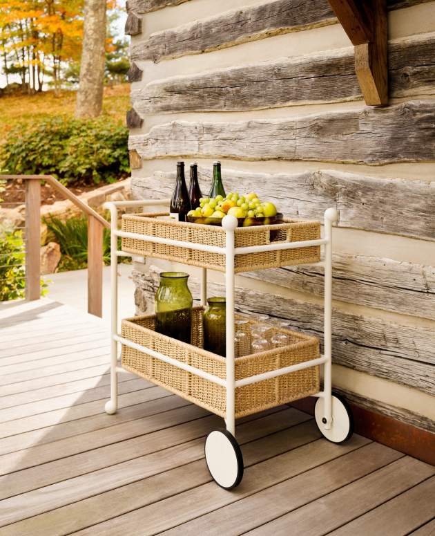 Thirza Drinks Cart finished in York River Oyster against a log cabin