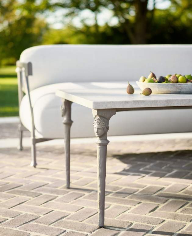 Dionysus Sculptura Coffee Table paired with the Bastille Collection Shown in Esmont Slate with Taj Mahal Natural Stone Top