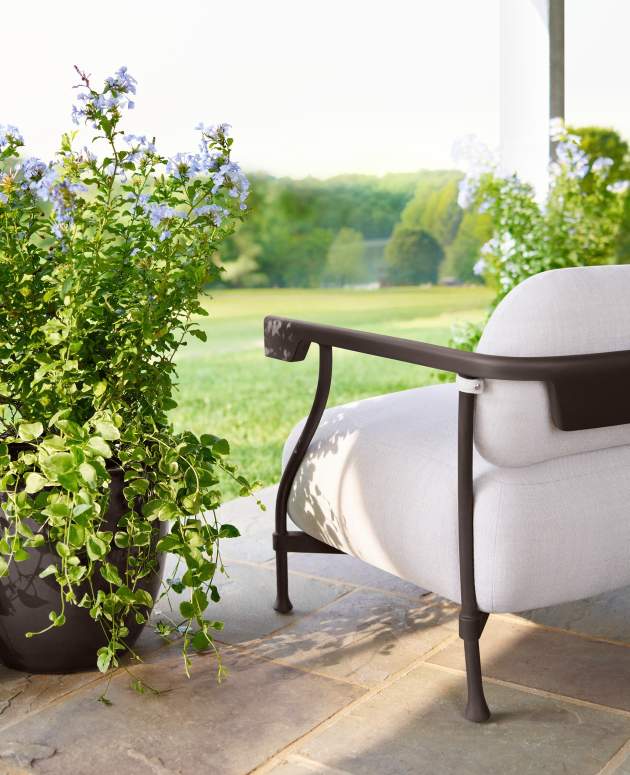 Bastille Club Chair and Side Table shown in Natural Bronze with La Dolce Vita Feather Fabric
