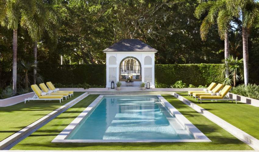 duVal Sun Chaises poolside at a home in Florida, Design by Carrier & Co, Photos by Brantley Photography