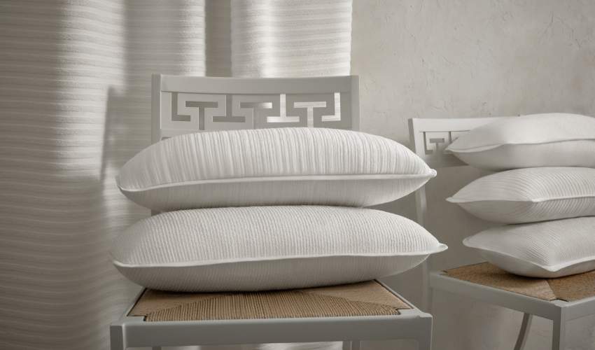 McKinnon and Harris Toccare Italian Performance Fabric Collection in our signature Swan Colorway, upholstered on throw pillows