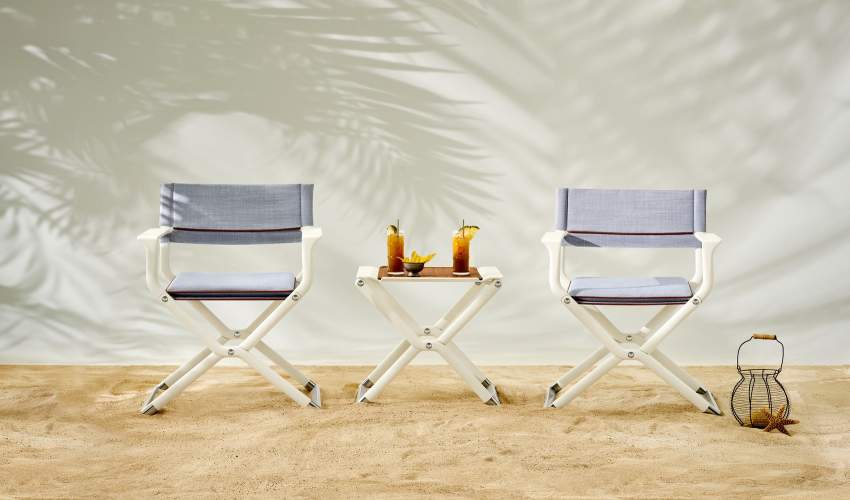 McKinnon and Harris folding yacht chairs and folding yacht table with Goombay Smash Cocktails on it