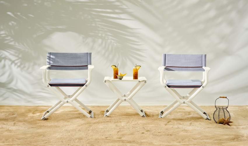 Scout Folding Yacht Table and Chairs shown in classic white