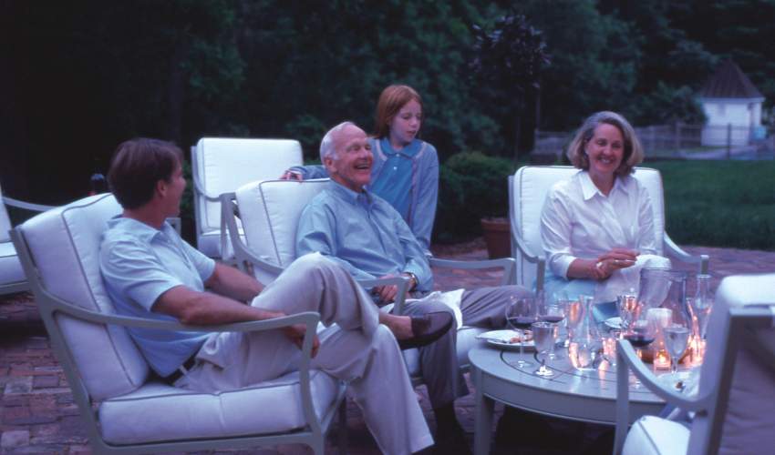 The Massie family enjoying time outdoors in the McKinnon and Harris Beaufort furniture collection