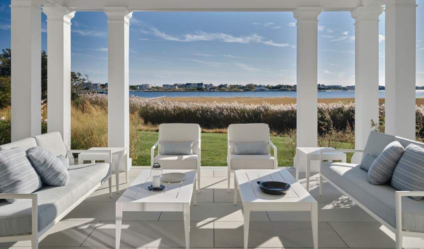 deCamp Sofas and Club Chairs under a Pergola at a home Designed by Victoria Hagan Interiors, Photos by Douglas Friedman