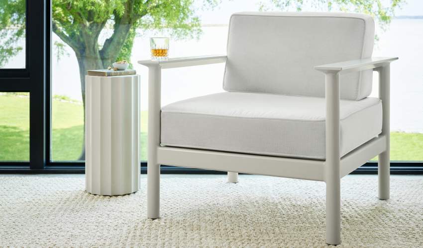Couper Club Chair with Whiskey Sour on Arm of Chair