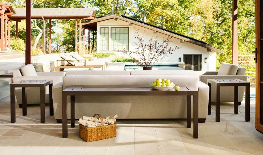 Peristyle Sofa and Club Chairs paired with Parsons Side Tables and Console Table finished in Jura Peat