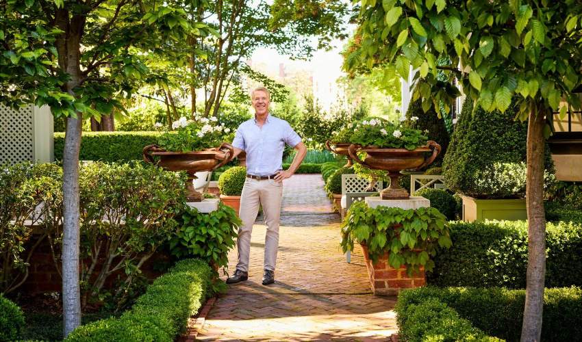 McKinnon and Harris co-founder Will Massie in his Richmond, Va backyard garden