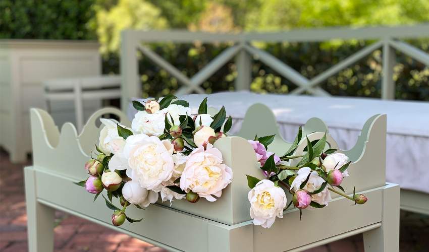 McKinnon and Harris Gilliam Tray Table with flowers on top
