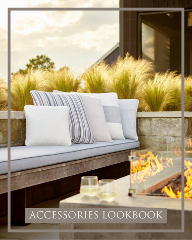 McKinnon and Harris throw pillows next to an outdoor firepit